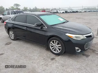 2014 Toyota Avalon Limited with VIN 4T1BK1EB3EU132555, listed as a IAAI auction lot 41883284 with 263,238 mi miles. Bid and sale history available at carsss.com. Image 1.