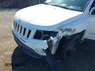 2016 Jeep Compass Sport with VIN 1C4NJDBB6GD647367, listed as a IAAI auction lot 41818920 with 169,037 mi miles and . Bid and sale history available at carsss.com. Image 6.