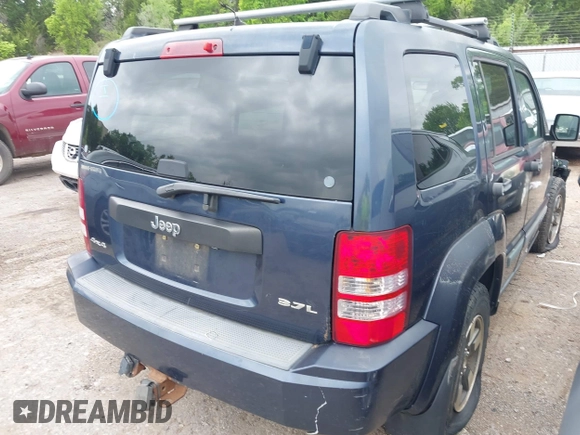 2008 Jeep Liberty Sport with VIN 1J8GN28K28W261858, listed as a IAAI auction lot 42122117 with 97,865 mi miles. Bid and sale history available at carsss.com. Image 4.