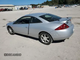 2000 Mercury Cougar z VIN 1ZWFT61L4Y5641222, wystawiony jako Copart lot #75313314 z przebiegiem 138 909 mil mil oraz Szkody całkowita. Historia ofert i sprzedaży dostępna na DreamBid. Obrazek 2.