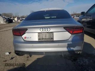 2017 Audi RS 7 Prestige z VIN WUAWAAFC8HN903853, wystawiony jako Copart lot #86112964 z przebiegiem 57 313 mil mil oraz Szkody całkowita. Historia ofert i sprzedaży dostępna na DreamBid. Obrazek 6.