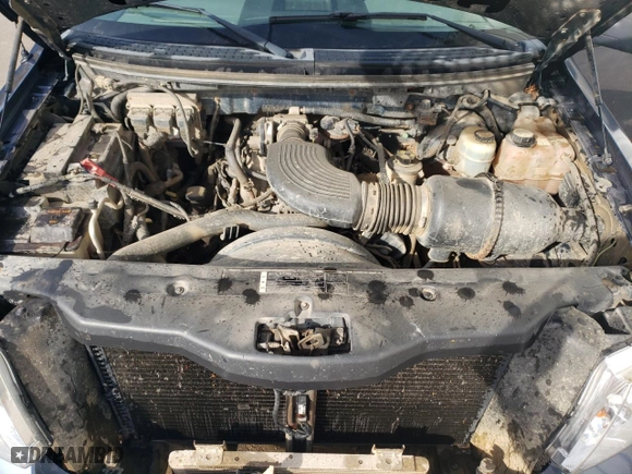 2005 Ford F-150 STX with VIN 1FTRX04W75KC31023, listed as a Copart auction lot 77093034 with 266,966 mi miles and Salvage Title. Bid and sale history available at carsss.com. Image 12.