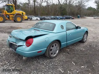 2002 Ford Thunderbird w/Hardtop Premium with VIN 1FAHP60A12Y105103, listed as a IAAI auction lot 41391107 with 138,953 mi miles. Bid and sale history available at carsss.com. Image 4.
