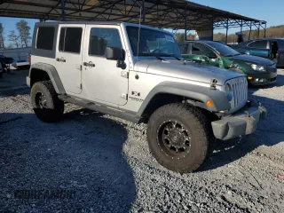 2009 Jeep Wrangler Unlimited X with VIN 1J4GA39179L756228, listed as a Copart auction lot 50086445 with 158,274 mi miles and Salvage Title. Bid and sale history available at carsss.com. Image 4.