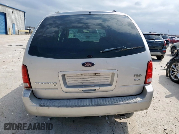 2004 Ford Freestar SEL z VIN 2FMZA52214BA84555, wystawiony jako Copart lot #54569535 z przebiegiem Nie podano mil oraz Szkoda całkowita • Salvage title. Historia ofert i sprzedaży dostępna na DreamBid. Obrazek 6.