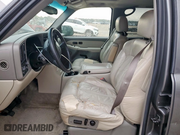 2002 Chevrolet Tahoe LT with VIN 1GNEC13Z22J139029, listed as a Copart auction lot 59149945 with 188,598 mi miles and Salvage title. Bid and sale history available at DreamBid. Image 7.