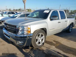 2010 Chevrolet Silverado 1500 LT with VIN 3GCRCSE02AG195809, listed as a IAAI auction lot 42011389 with 94,755 mi miles. Bid and sale history available at carsss.com. Image 2.