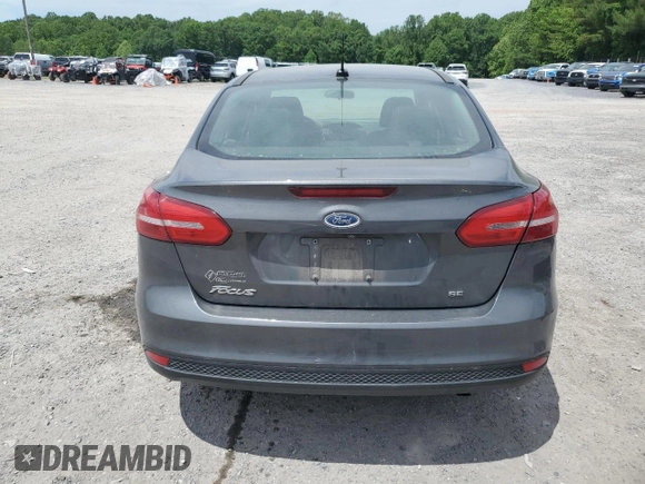 2017 Ford Focus SE with VIN 1FADP3F2XHL201380, listed as a Copart auction lot 56942815 with 136,169 mi miles and Salvage title. Bid and sale history available at DreamBid. Image 6.