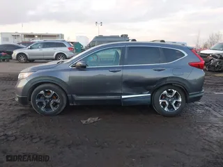2017 Honda CR-V Touring with VIN 2HKRW2H94HH617081, listed as a IAAI auction lot 41294254 with 145,140 mi miles. Bid and sale history available at carsss.com. Image 14.