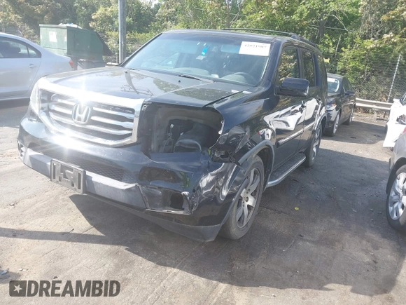 2012 Honda Pilot Touring with VIN 5FNYF4H95CB026191, listed as a IAAI auction lot 42021987 with 229,273 mi miles and . Bid and sale history available at DreamBid. Image 2.