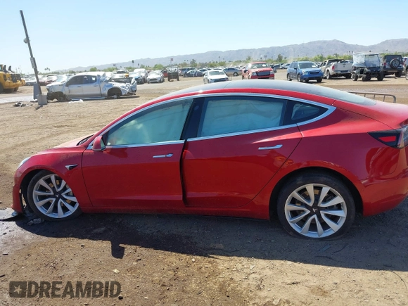 2018 Tesla Model 3 Long Range Battery with VIN 5YJ3E1EA3JF163654, listed as a IAAI auction lot 42193809 with Not Provided miles and . Bid and sale history available at DreamBid. Image 14.