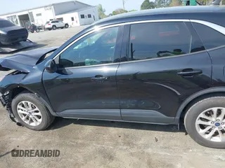 2020 Ford Escape SE z VIN 1FMCU9G69LUB40332, wystawiony jako IAAI lot #42006879 z przebiegiem 82 291 mil mil oraz . Historia ofert i sprzedaży dostępna na DreamBid. Obrazek 14.