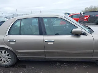 2003 Ford Crown Victoria LX z VIN 2FAFP74W13X120754, wystawiony jako IAAI lot #42212879 z przebiegiem 91 438 mil mil oraz . Historia ofert i sprzedaży dostępna na DreamBid. Obrazek 13.