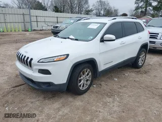 2017 Jeep Cherokee Latitude with VIN 1C4PJLCB9HW572123, listed as a IAAI auction lot 41610441 with 106,738 mi miles. Bid and sale history available at carsss.com. Image 17.