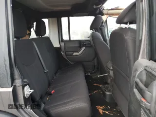 2018 Jeep Wrangler JK Unlimited Sport S with VIN 1C4BJWDG7JL814744, listed as a Copart auction lot 77830714 with 130,229 mi miles and Salvage Title. Bid and sale history available at carsss.com. Image 10.