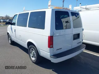 2003 Chevrolet Astro with VIN 1GNDM19X43B100114, listed as a IAAI auction lot 41898727 with 130,473 mi miles. Bid and sale history available at carsss.com. Image 3.