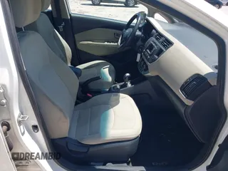 2013 Kia Rio SX with VIN KNADN4A33D6174454, listed as a IAAI auction lot 42032612 with 157,199 mi miles. Bid and sale history available at carsss.com. Image 5.