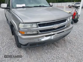 2003 Chevrolet Suburban LT z VIN 1GNEC16Z13J140136, wystawiony jako IAAI lot #42142827 z przebiegiem 252 698 mil mil oraz . Historia ofert i sprzedaży dostępna na DreamBid. Obrazek 6.