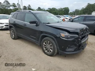 2019 Jeep Cherokee Latitude Plus with VIN 1C4PJLLB4KD344520, listed as a Copart auction lot 54535535 with 121,277 mi miles and Salvage Title. Bid and sale history available at DreamBid. Image 4.