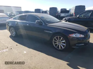 2012 Jaguar XJ with VIN SAJWA1CB7CLV33879, listed as a Copart auction lot 88708995 with Not provided miles and Salvage title. Bid and sale history available at DreamBid. Image 4.