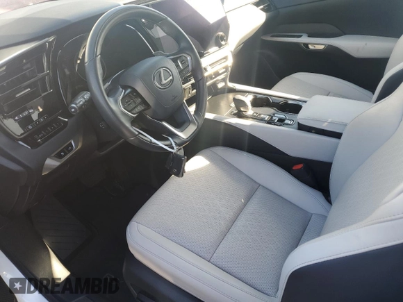 2023 Lexus RX with VIN JTJCHMAA8P2001493, listed as a Copart auction lot 74231914 with 1,228 mi miles and Non Repairable. Bid and sale history available at carsss.com. Image 7.