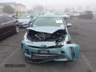 2022 Toyota Prius L Eco with VIN JTDKAMFU9N3186859, listed as a IAAI auction lot 41486941 with 122,665 mi miles and . Bid and sale history available at DreamBid. Image 12.