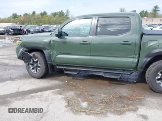 2021 Toyota Tacoma SR with VIN 3TMCZ5AN5MM380286, listed as a IAAI auction lot 42165523 with 58,965 mi miles and . Bid and sale history available at DreamBid. Image 6.