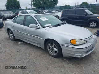 2001 Pontiac Grand Am GT1 z VIN 1G2NV52E11C280089, wystawiony jako IAAI lot #42456267 z przebiegiem 109 748 mil mil oraz . Historia ofert i sprzedaży dostępna na DreamBid. Obrazek 1.