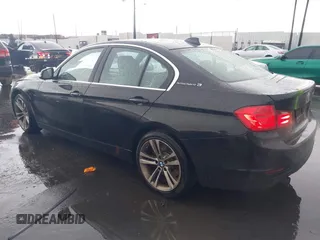 2013 BMW 3 Series ActiveHybrid 3 with VIN WBA3F9C57DF483994, listed as a IAAI auction lot 41797778 with 92,313 mi miles. Bid and sale history available at carsss.com. Image 3.