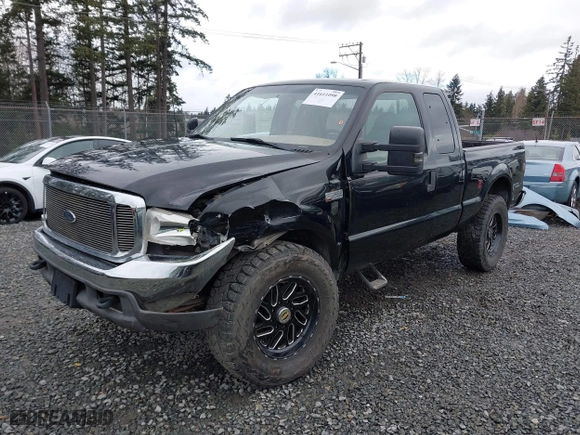 1999 Ford Super Duty F-250 XL with VIN 1FTNX21F2XEC99584, listed as a IAAI auction lot 41611098 with 424,263 mi miles. Bid and sale history available at carsss.com. Image 17.