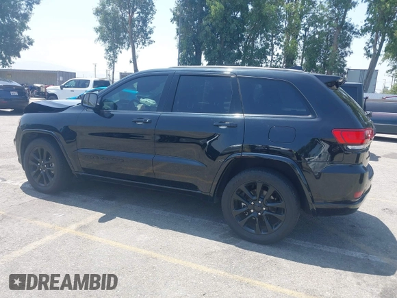 2018 Jeep Grand Cherokee Altitude with VIN 1C4RJEAG2JC428536, listed as a IAAI auction lot 42472960 with 74,631 mi miles and . Bid and sale history available at DreamBid. Image 14.