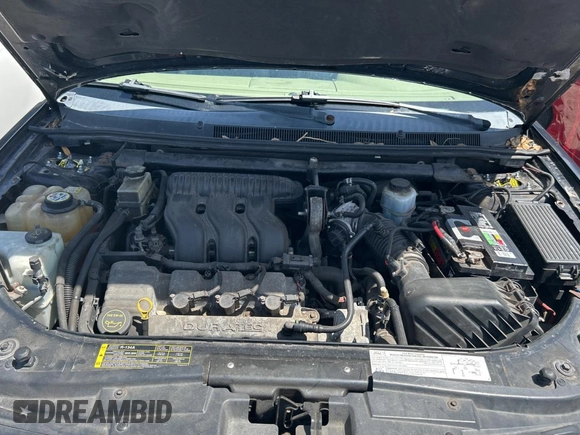 2005 Ford Five Hundred SEL z VIN 1FAFP24185G146669, wystawiony jako Copart lot #51990845 z przebiegiem Nie podano mil oraz Czysty tytuł • Clean title. Historia ofert i sprzedaży dostępna na DreamBid. Obrazek 7.