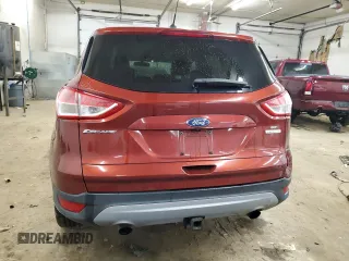 2016 Ford Escape SE z VIN 1FMCU0G9XGUB59807, wystawiony jako Copart lot #57920065 z przebiegiem 124 482 mil mil oraz Szkoda całkowita • Salvage title. Historia ofert i sprzedaży dostępna na DreamBid. Obrazek 6.