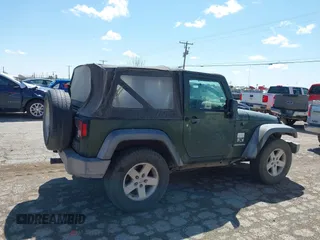 2009 Jeep Wrangler X with VIN 1J4FA24169L711018, listed as a IAAI auction lot 42178480 with 195,611 mi miles and . Bid and sale history available at DreamBid. Image 13.