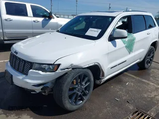 2018 Jeep Grand Cherokee Altitude with VIN 1C4RJFAG0JC296947, listed as a IAAI auction lot 42034656 with 93,979 mi miles and . Bid and sale history available at DreamBid. Image 6.