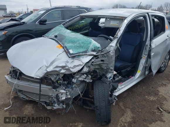 2012 Toyota Yaris L with VIN JTDKTUD35CD518484, listed as a IAAI auction lot 41863849 with 106,024 mi miles. Bid and sale history available at carsss.com. Image 6.