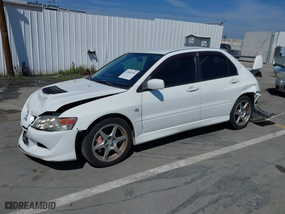 2005 Mitsubishi Lancer Evolution VIII with VIN JA3AH86DX5U054278, listed as a IAAI auction lot 41881180 with 157,497 mi miles. Bid and sale history available at carsss.com. Image 2.