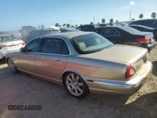 2005 Jaguar XJ with VIN SAJWA79C05SG46913, listed as a Copart auction lot 75092794 with 0 mi miles and Salvage Title. Bid and sale history available at carsss.com. Image 2.