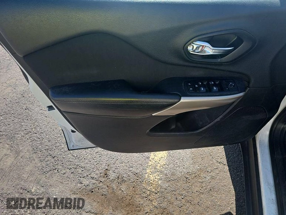 2017 Jeep Cherokee Sport with VIN 1C4PJLABXHW660505, listed as a IAAI auction lot 42680671 with 98,907 mi miles and . Bid and sale history available at DreamBid. Image 29.