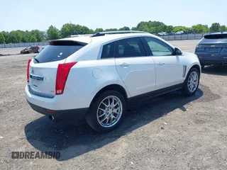 2013 Cadillac SRX Performance Collection z VIN 3GYFNDE35DS578495, wystawiony jako IAAI lot #42323061 z przebiegiem 160 473 mil mil oraz . Historia ofert i sprzedaży dostępna na DreamBid. Obrazek 4.