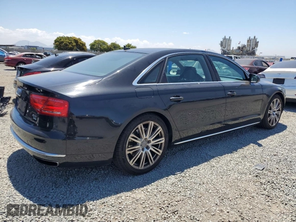 2013 Audi A8 4.0L with VIN WAUR2AFD5DN010742, listed as a Copart auction lot 62687735 with 107,984 mi miles and Salvage title. Bid and sale history available at DreamBid. Image 3.