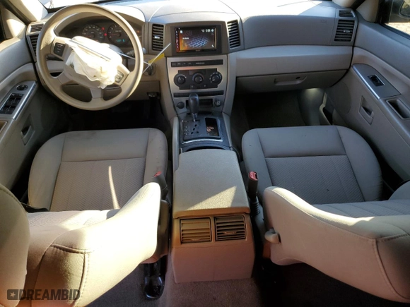 2005 Jeep Grand Cherokee Laredo with VIN 1J4HS48N65C732587, listed as a Copart auction lot 80656084 with 214,037 mi miles and Salvage Title. Bid and sale history available at carsss.com. Image 8.