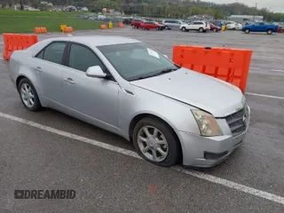 2009 Cadillac CTS AWD w/1SA with VIN 1G6DG577990155465, listed as a IAAI auction lot 41947102 with 1 mi miles. Bid and sale history available at carsss.com. Image 1.