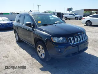 2014 Jeep Compass Sport with VIN 1C4NJCBA6ED630812, listed as a IAAI auction lot 42026664 with 134,445 mi miles. Bid and sale history available at carsss.com. Image 1.