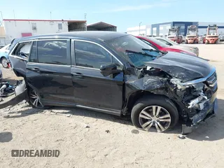 2016 Honda Pilot EX-L with VIN 5FNYF6H74GB048649, listed as a IAAI auction lot 41614843 with 132,264 mi miles. Bid and sale history available at carsss.com. Image 13.