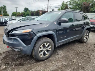 2014 Jeep Cherokee Trailhawk с VIN 1C4PJMBS3EW127928, выставлен на аукционе Copart как лот 63825865 с пробегом 172 712 миль миль и Списание • Salvage title. История ставок и продаж доступна на DreamBid. Изображение 1.