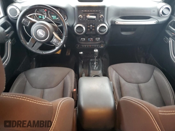 2015 Jeep Wrangler Unlimited Sahara with VIN 1C4BJWEGXFL606573, listed as a Copart auction lot 83983894 with 103,314 mi miles and Clean title. Bid and sale history available at DreamBid. Image 8.