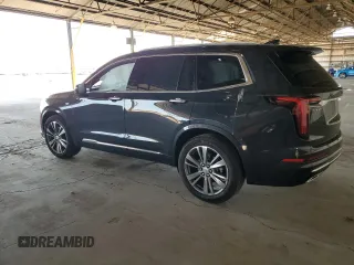 2020 Cadillac XT6 FWD Premium Luxury with VIN 1GYKPCRS8LZ149860, listed as a Copart auction lot 61108985 with 58,459 mi miles and Salvage title. Bid and sale history available at DreamBid. Image 2.