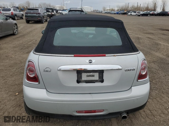 2012 MINI Convertible with VIN WMWZN3C57CT135185, listed as a Copart auction lot 78580644 with 83,027 mi miles and Salvage Title. Bid and sale history available at DreamBid. Image 6.