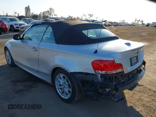 2011 BMW 1 Series 128i with VIN WBAUN1C59BVH83776, listed as a IAAI auction lot 41616463 with 55,865 mi miles and . Bid and sale history available at DreamBid. Image 3.
